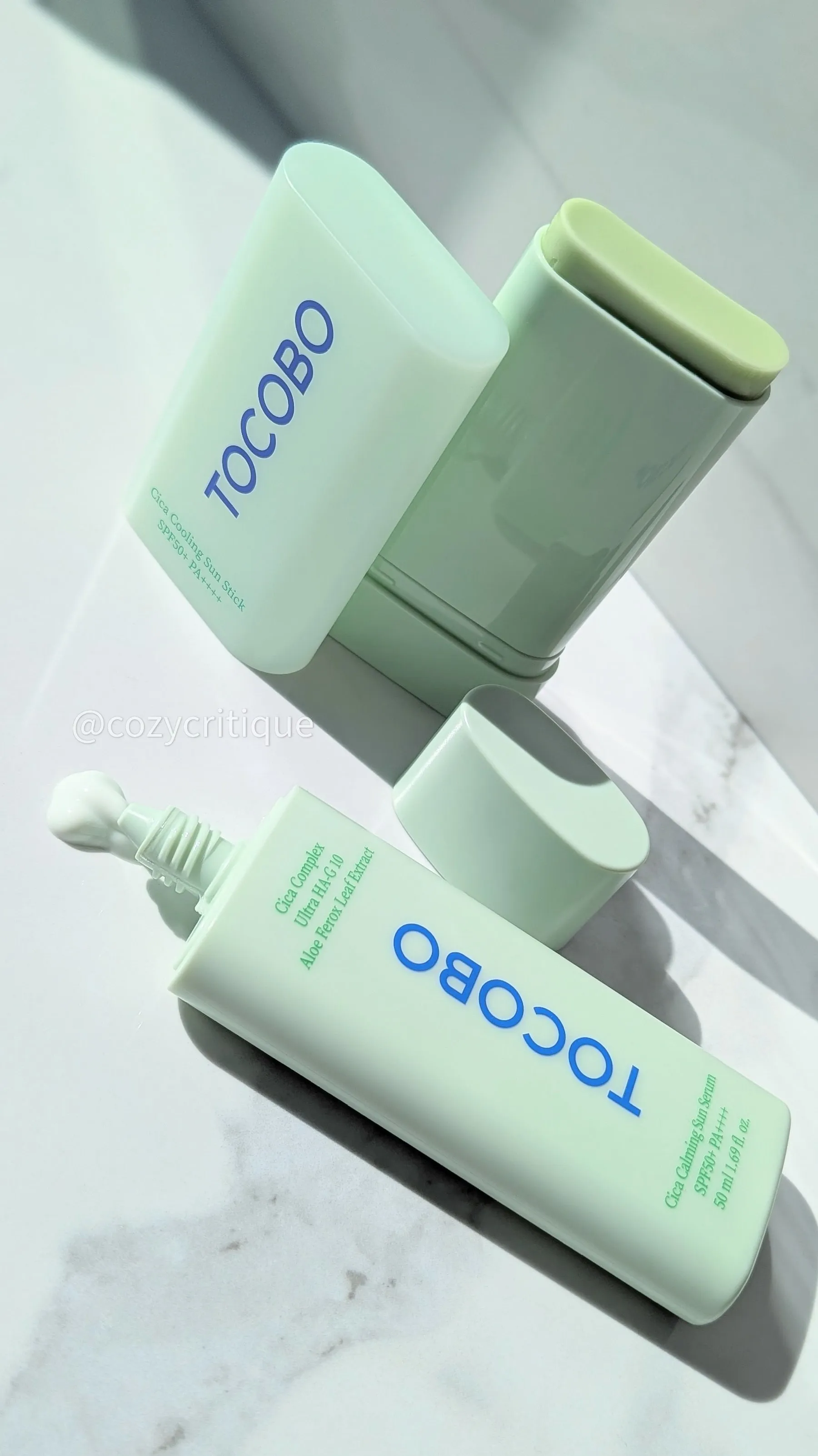 Showing the textures of both Tocobo sunscreens