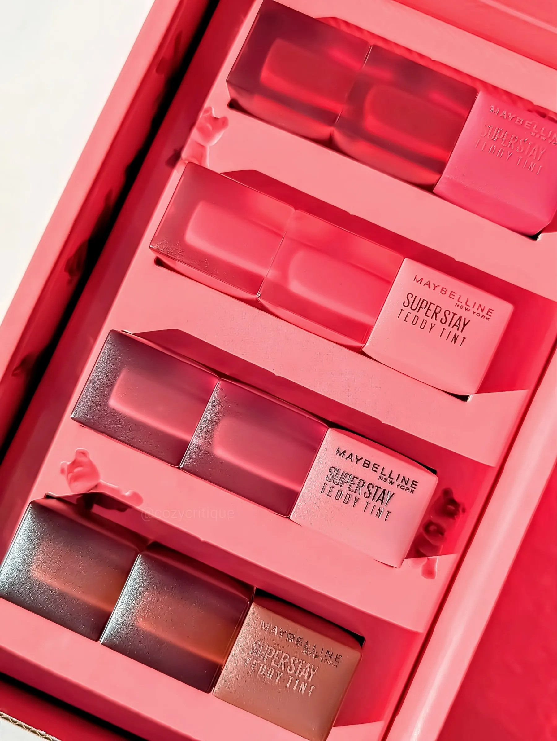 A set of Maybelline Super Stay Teddy Tint lip tints in their packaging