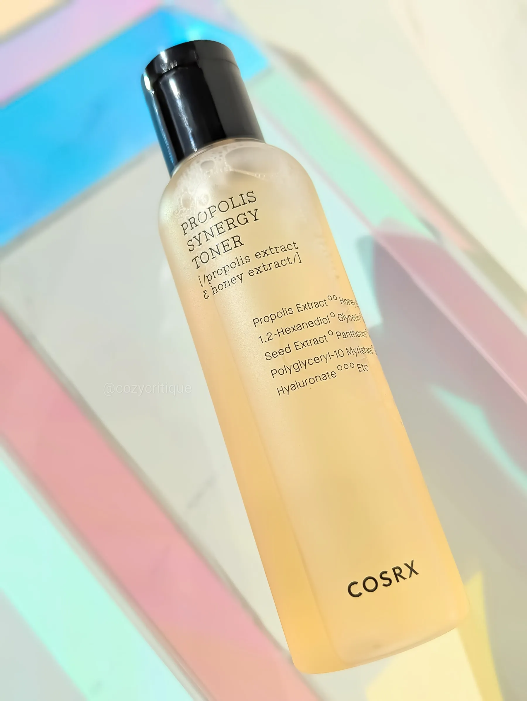 COSRX Propolis toner laying on a tray