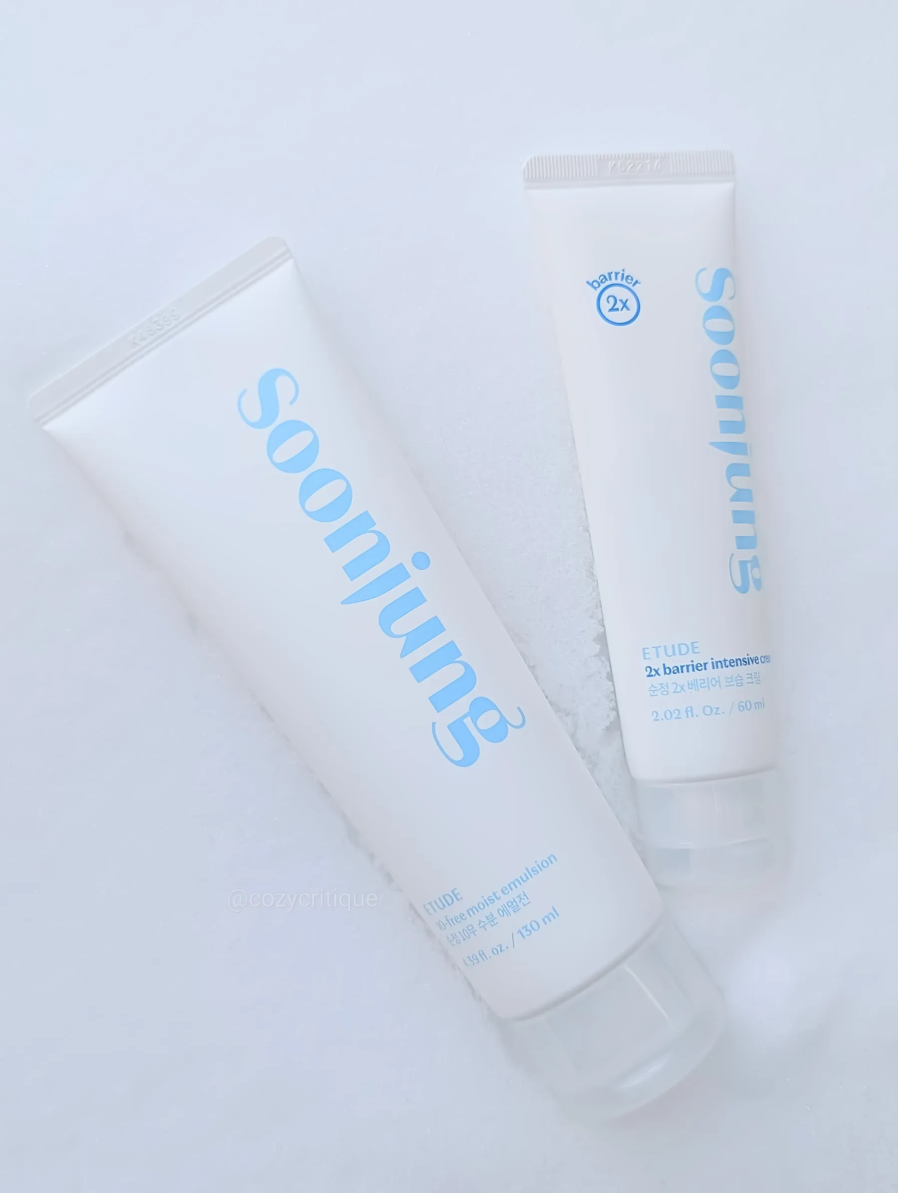 Two white skincare tubes labeled "Soonjung" on a snowy background, featuring blue text and a clean, minimal design.